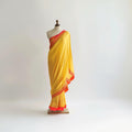 Handcrafted Yellow Silk Sari with Red Border